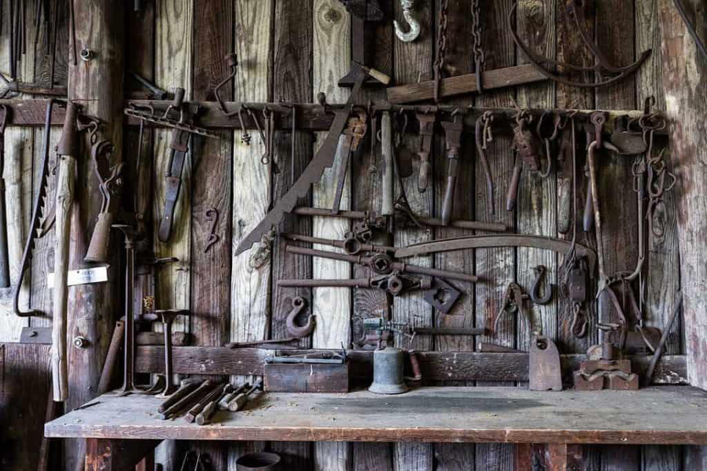 workbench with rusted tools